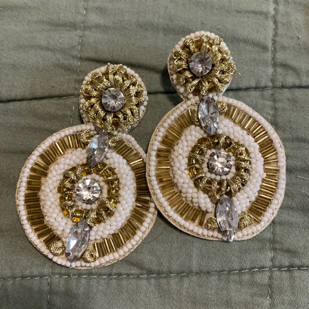 White and gold earrings